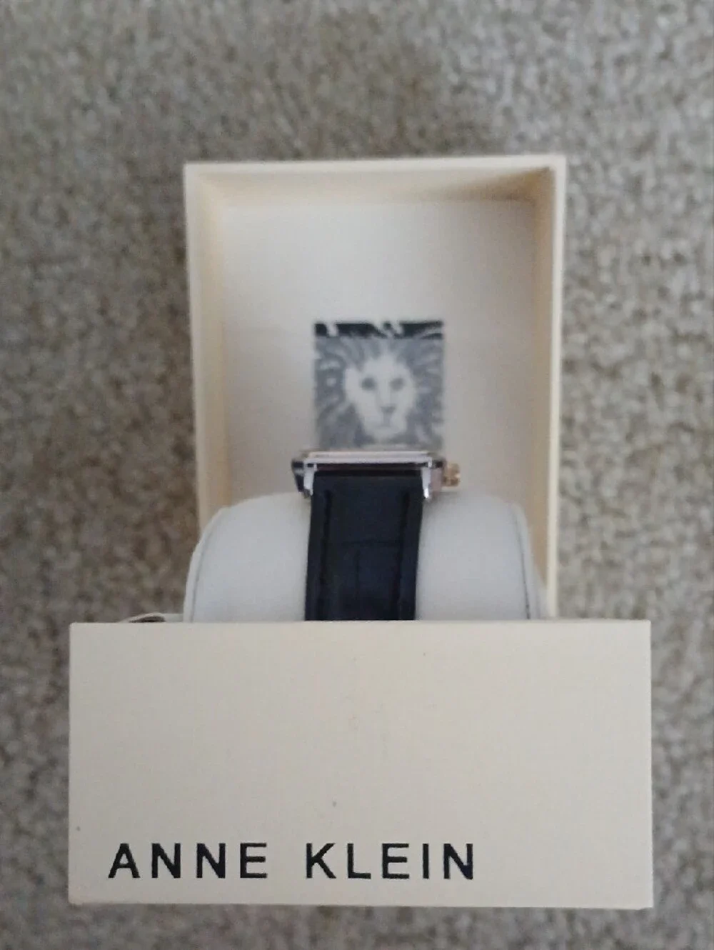 Anne Klein Rectangular Gold Tone Case Watch with Black Leather Strap